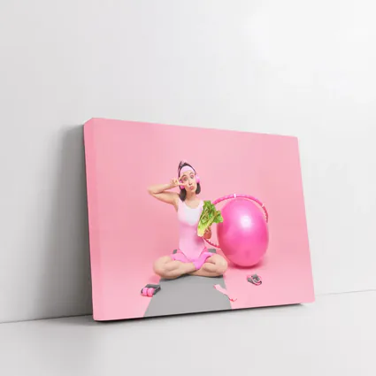 Fitness Girl Sitting With Exercise Ball Pink