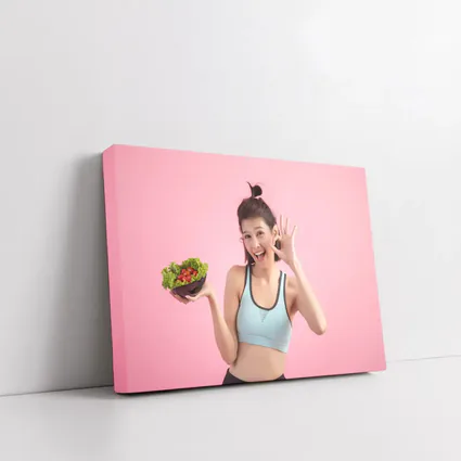 Fit Woman Holding Salad Bowl Pink Background