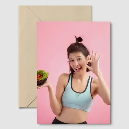 Fit Woman Holding Salad Bowl Pink Background