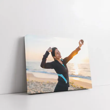 Woman Celebrating Victory at Sunrise Beach