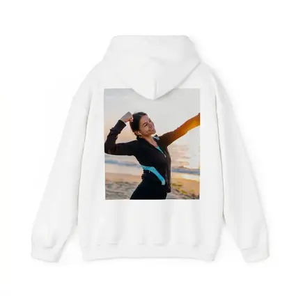 Woman Celebrating Victory at Sunrise Beach