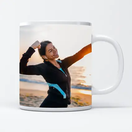 Woman Celebrating Victory at Sunrise Beach