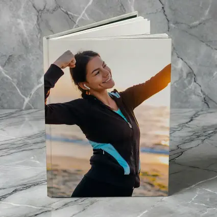 Woman Celebrating Victory at Sunrise Beach