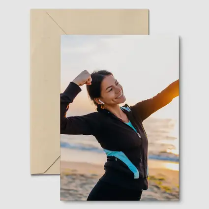 Woman Celebrating Victory at Sunrise Beach