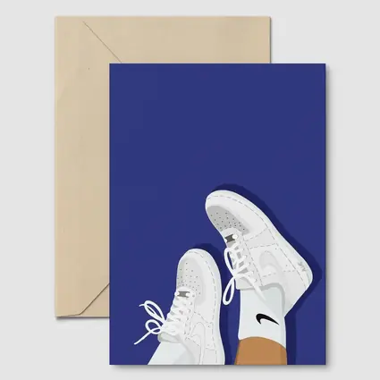 White Nike Air Force Ones Blue Background