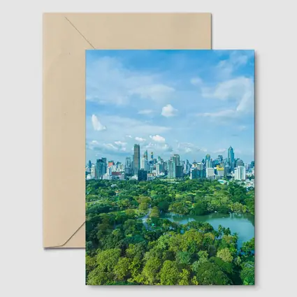 Bangkok City Skyline Above Lush Green Park