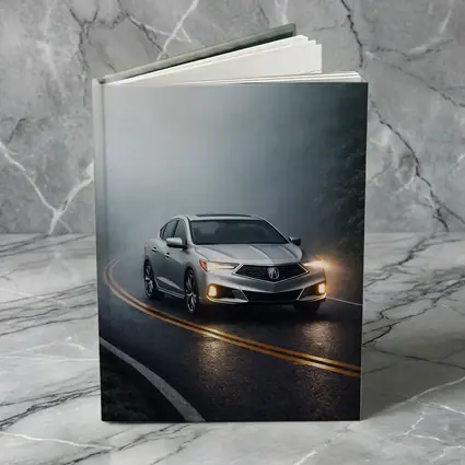 Acura ILX Sedan Driving Through Misty Road