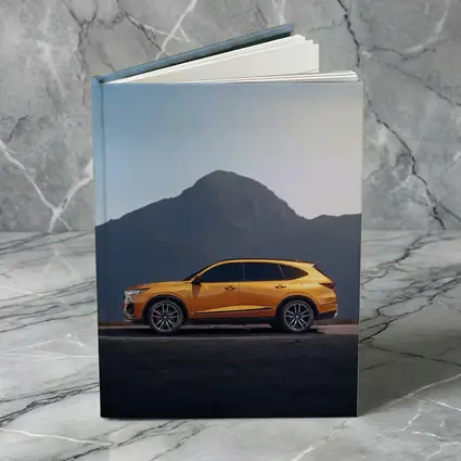 Acura MDX Orange SUV Mountain Background