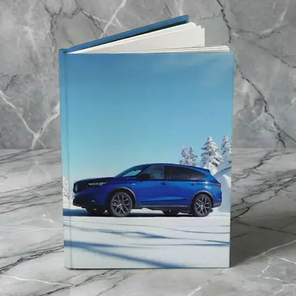 Acura MDX Blue SUV Snowy Winter Scene