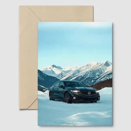 Acura TLX Black Sedan Snowy Mountain Backdrop