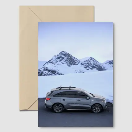 Acura MDX Gray SUV Snowy Mountain Backdrop