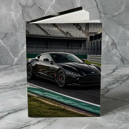 Aston Martin Vantage Black on Racing Track