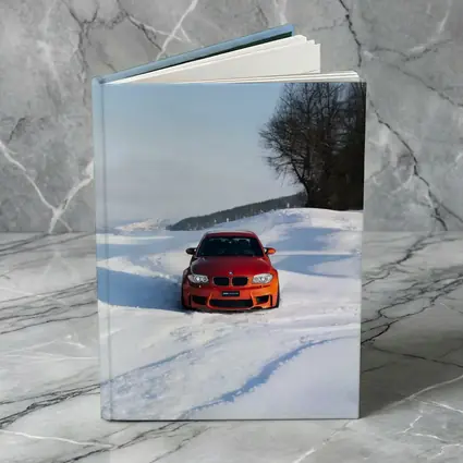 BMW 1M Coupe Orange Snow Winter Drive