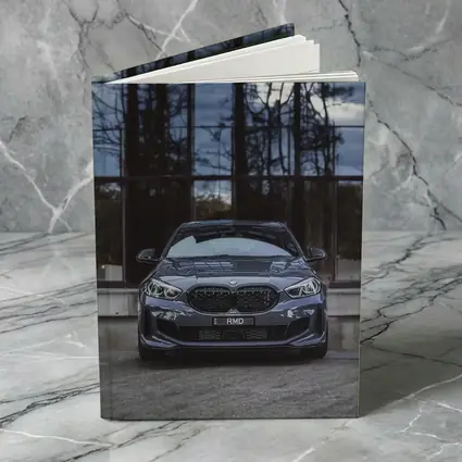 BMW M135i Front View Glass Building