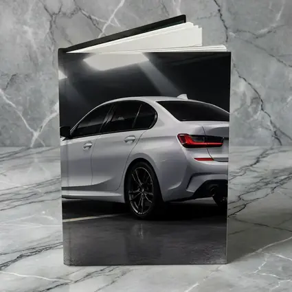 BMW 3 Series White Sedan Dark Garage