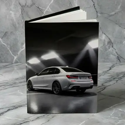 BMW 3 Series White Sedan Dark Garage