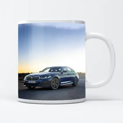 BMW 5 Series Blue Sedan Open Road