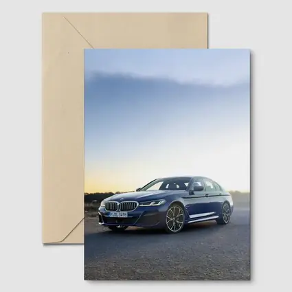 BMW 5 Series Blue Sedan Open Road