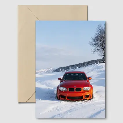BMW M1 Orange Car In Snow