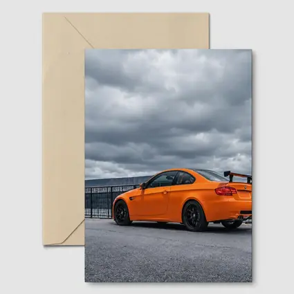 BMW M3 GTS Orange Coupe Cloudy Sky