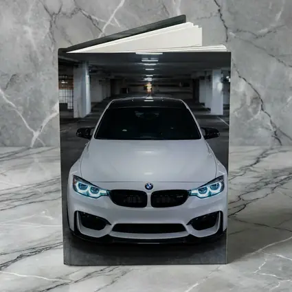 BMW M3 White Front View Parking Garage