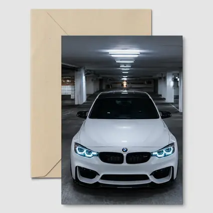 BMW M3 White Front View Parking Garage