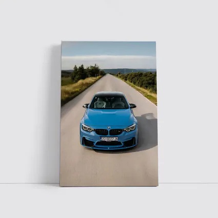 BMW M4 Blue Front View Open Road