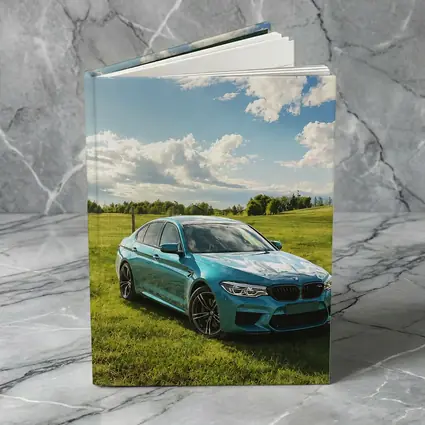 BMW M5 Sedan Parked On Green Field