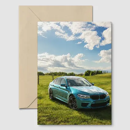 BMW M5 Sedan Parked On Green Field
