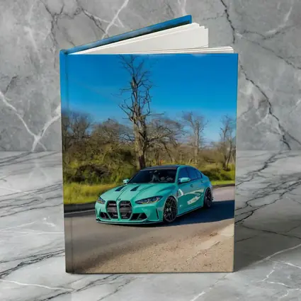 BMW M3 Teal Wrap On Open Road