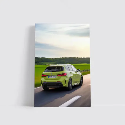 BMW M135i Green Hatchback On Open Road