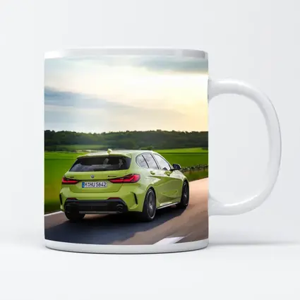 BMW M135i Green Hatchback On Open Road