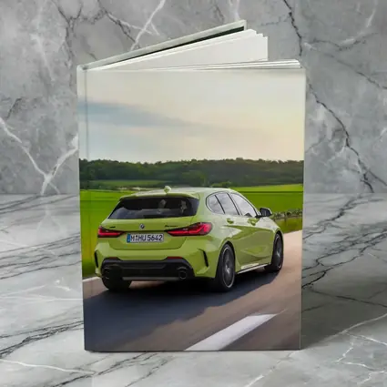 BMW M135i Green Hatchback On Open Road