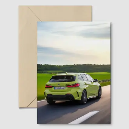 BMW M135i Green Hatchback On Open Road