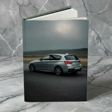 BMW M140i Silver Hatchback Overcast Road