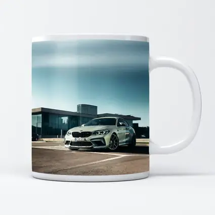 BMW M2 Competition Silver Parked Outside Building