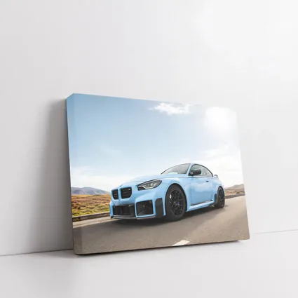 BMW M2 Light Blue On Open Road