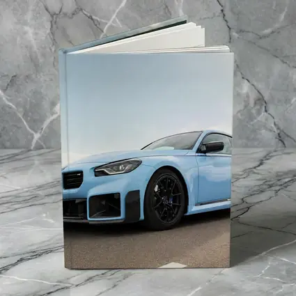 BMW M2 Light Blue On Open Road