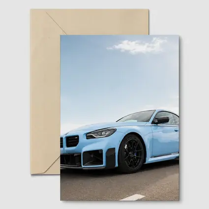 BMW M2 Light Blue On Open Road