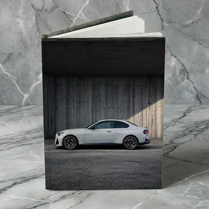 BMW M2 Coupe Parked Against Concrete Wall