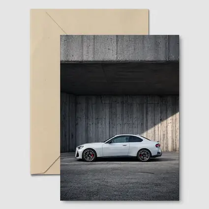 BMW M2 Coupe Parked Against Concrete Wall