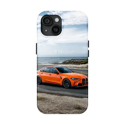 BMW M3 Orange Sedan Coastal Road Shot