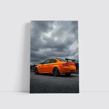 BMW M3 GTS Orange Under Stormy Sky