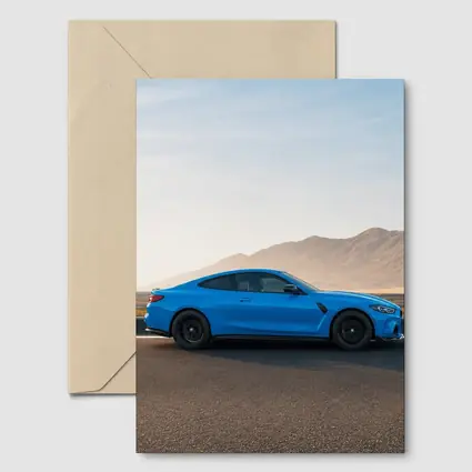 BMW M4 Blue Coupe Desert Road Side View