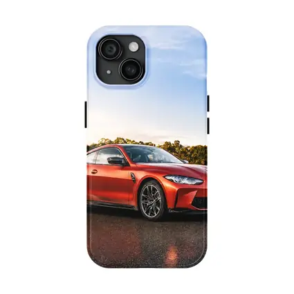 BMW M4 Orange Coupe Wet Parking Lot