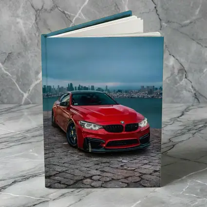 Red BMW M4 City Skyline Background
