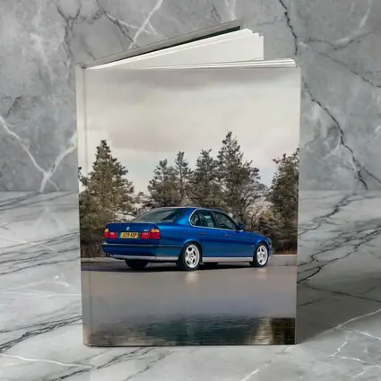BMW M5 E34 Blue Sedan Outdoor Shot
