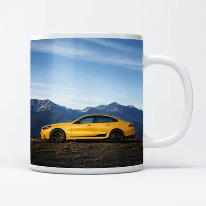 BMW M5 Yellow Sedan Mountain Backdrop