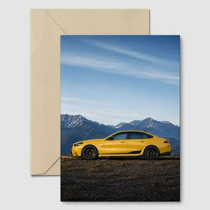 BMW M5 Yellow Sedan Mountain Backdrop