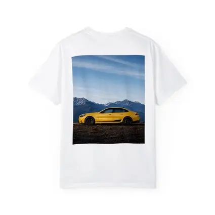 BMW M5 Yellow Sedan Mountain Backdrop